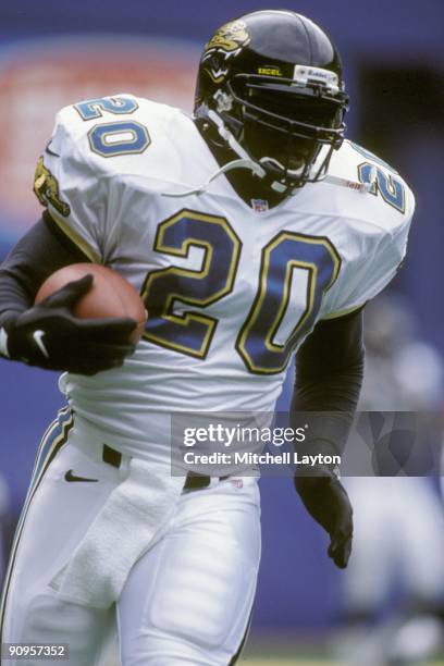 Natrone Means of the Jacksonville Jaguars runs with the ball during a NFL football game against the Pittsburgh Steelers on November17, 1996 at Three...