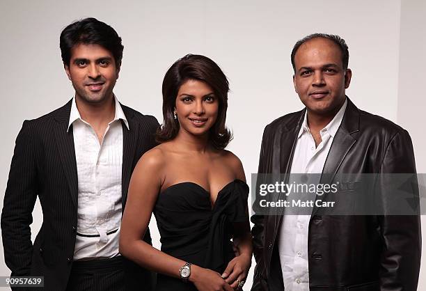 Actors Harman Baweja, Priyanka Chopra and director Ashutosh Gowariker from the film 'What's Your Rashee' poses for a portrait during the 2009 Toronto...