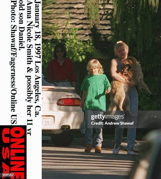 January 18, 1997 Los Angeles Anna Nicole Smith and possibly her 11 year old son Daniel from her teenage marriage to husband Billy Smith & their pet...