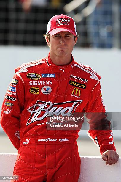 Kasey Kahne diver of car Budweiser Dodge looks on during qualifying for the NASCAR Sprint Cup Series Sylvania 300 at the New Hampshire Motor Speedway...