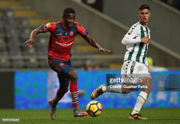 Oliveirense forward Fabian Cuero from Colombia with Vitoria Setubal midfielder Andre Pedrosa from Portugal in action during the Taca da Liga Semi...