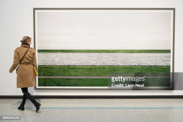 Woman poses in front of "Rhine II" by Andreas Gursky in the re-opened Hayward Gallery on January 24, 2018 in London, England. Following a two-year...