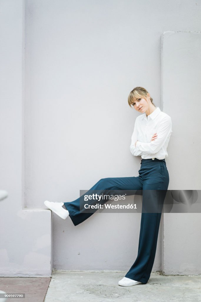 Portrait of confident woman standing