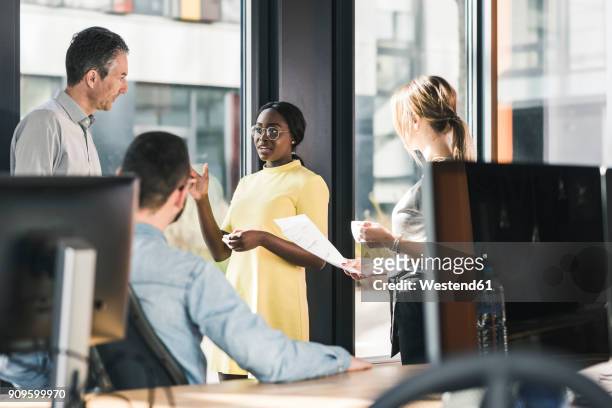 business people having a meeting in office - employee engagement stock-fotos und bilder