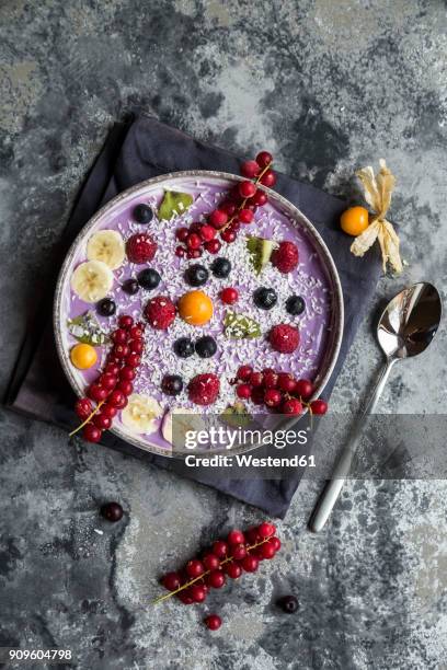 yogurt with fruits, blueberry, red currants, raspberry, kiwi, banane, physalis - banane stock pictures, royalty-free photos & images