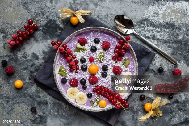 yogurt with fruits, blueberry, red currants, raspberry, kiwi, banane, physalis - banane stock pictures, royalty-free photos & images