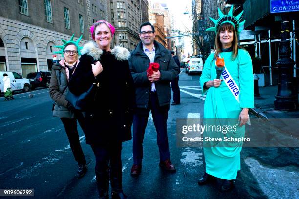 View of unidentified demonstrators at the Women's March on New York, New York, January 20, 2018. One woman is dressed as the Statue of Liberty, while...
