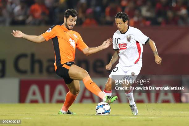 Victor Mattos Cardozo of Singha Chiangrai United tackles the ball from Irfan Bachdim of Bali United during the AFC Champions League 2018 Preliminary...