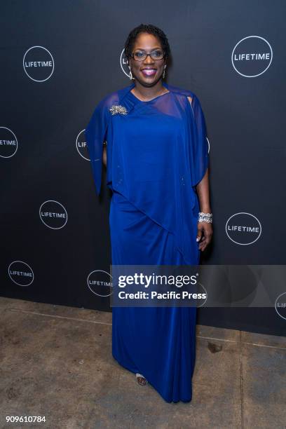 Antoinnette Tuff wearing dress by Marc Bouwer attends Faith Under Fire screening at Neuehouse Madisoan Square.