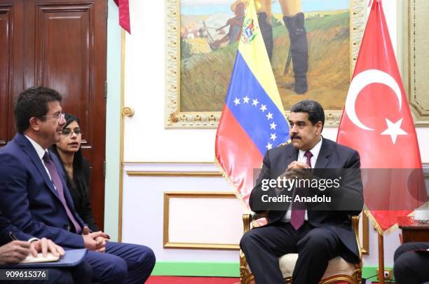 Turkish Economy Minister Nihat Zeybekci meets with Venezuelan President Nicolas Maduro during his official visit in Caracas, Venezuela on January 24,...