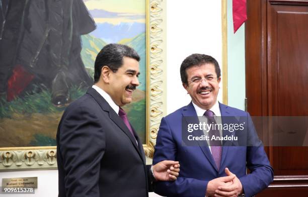 Turkish Economy Minister Nihat Zeybekci meets with Venezuelan President Nicolas Maduro during his official visit in Caracas, Venezuela on January 24,...