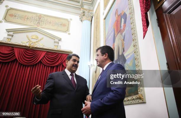 Turkish Economy Minister Nihat Zeybekci meets with Venezuelan President Nicolas Maduro during his official visit in Caracas, Venezuela on January 24,...