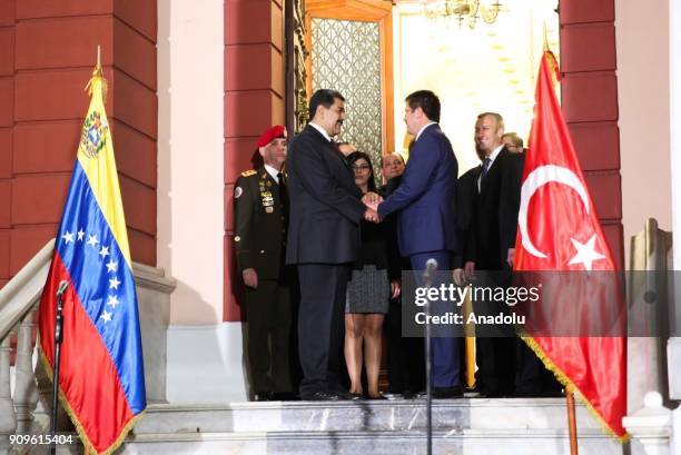 Turkish Economy Minister Nihat Zeybekci meets with Venezuelan President Nicolas Maduro during his official visit in Caracas, Venezuela on January 24,...