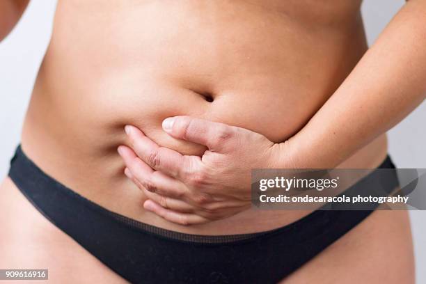 overweight belly - fat hips stock pictures, royalty-free photos & images