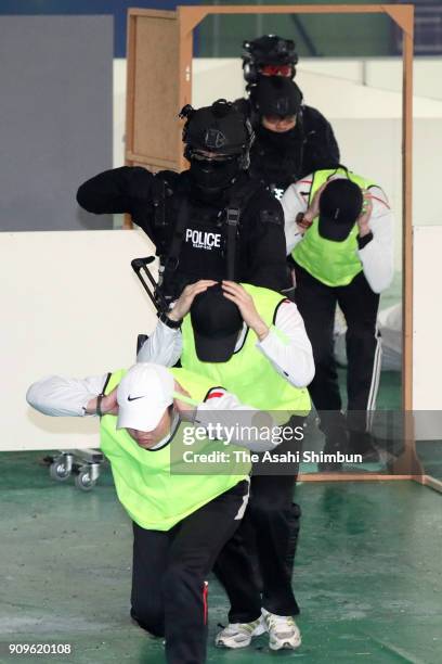 South Korean police SWAT team demonstrate the anti-terror operation at the starting ceremony of PyeongChang Olympic Security Force before the...