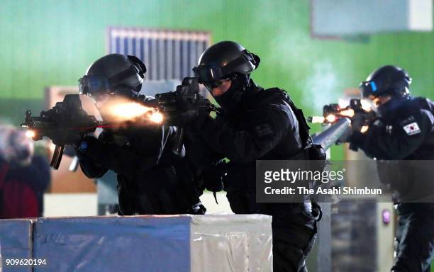 South Korean police SWAT team demonstrate the anti-terror operation at the starting ceremony of PyeongChang Olympic Security Force before the...