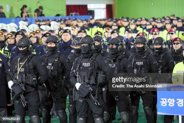 South Korean police SWAT team demonstrate the anti-terror operation at the starting ceremony of PyeongChang Olympic Security Force before the...