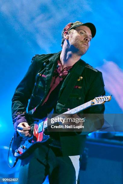 Jonny Buckland of Coldplay performs on stage at Wembley Stadium on September 18, 2009 in London, England.