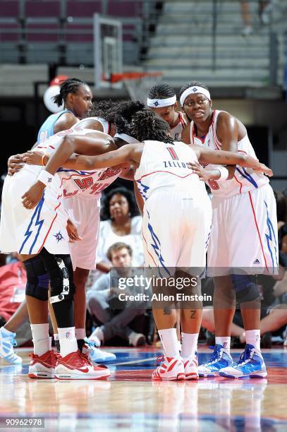 Nikki Teasley of the Detroit Shock huddles with her teammates during the game against the Atlanta Dream in Game one of the Eastern Conference...