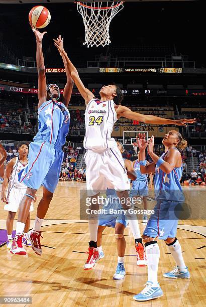 Michelle Snow of the Atlanta Dream goes to the basket against DeWanna Bonner of the Phoenix Mercury during the WNBA game on September 5, 2009 at US...