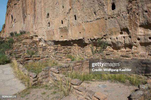 The Long House at the ancient cliff dwellings in Frijoles Canyon, Bandelier National Monument near Los Alamos, New Mexico, USA.