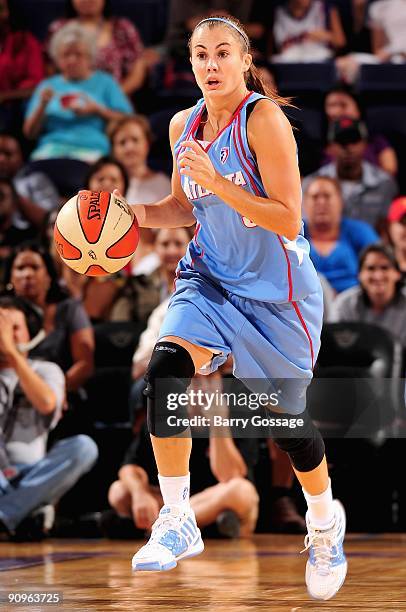 Shalee Lehning of the Atlanta Dream drives the ball up court during the WNBA game against the Phoenix Mercury on September 5, 2009 at US Airways...