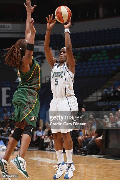 Roneeka Hodges of the Minnesota Lynx takes a jump shot against Shannon Johnson of the Seattle Storm during the game on September 5, 2009 at Target...