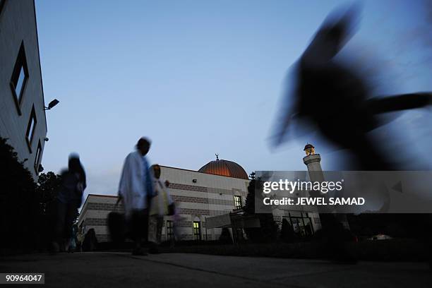 Muslim leave the MCC mosque after a prayer to break fast during their holy fasting month of Ramadan in Silver Spring, Maryland on September 18, 2009....