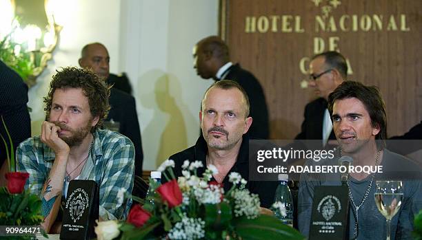 Singer song writers Jovanotti from Italy, Miguel Bose from Spain, and Juanes from Colombia, offer a press conference in Havana on September 18, 2009...