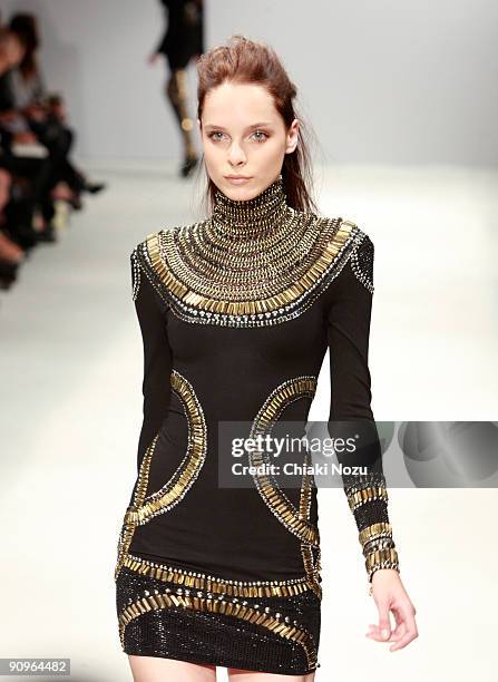 Model walks down the runway during the Sass & Bide LFW Spring Summer 2010 show at London Fashion Week 2009 at The Dairy on September 18, 2009 in...