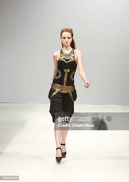 Model walks down the runway during the Sass & Bide LFW Spring Summer 2010 show at London Fashion Week 2009 at The Dairy on September 18, 2009 in...
