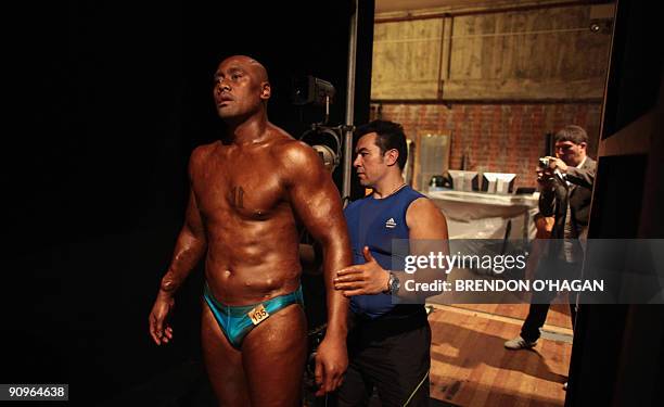 Jonah Lomu prepares to perform in the Wellington New Zealand Body Building Championships at Victoria Universty In Wellington on September 19, 2009....