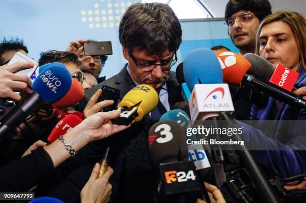 Carles Puigdemont, former Catalan president, pauses as he faces journalists following a meeting at the offices of the European Free Alliance in...