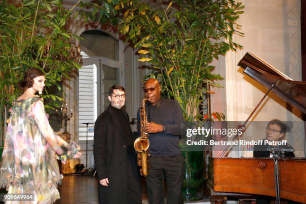 Stylist Franck Sorbier, Saxophonist Manu Dibango and models pose on the runway at the end of the Franck Sorbier Spring Summer 2018 show as part of...