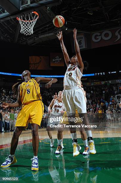 Camille Little of the Seattle Storm hits the game winning shot against DeLisha Milton Jones of the Los Angeles Sparks during game two of the WNBA...