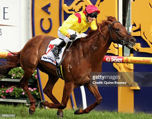 Glen Boss riding Turffontein crosses the line to win the Sir Rupert Clarke Stakes during the Underwood Stakes Day at Caulfield Racecourse on...