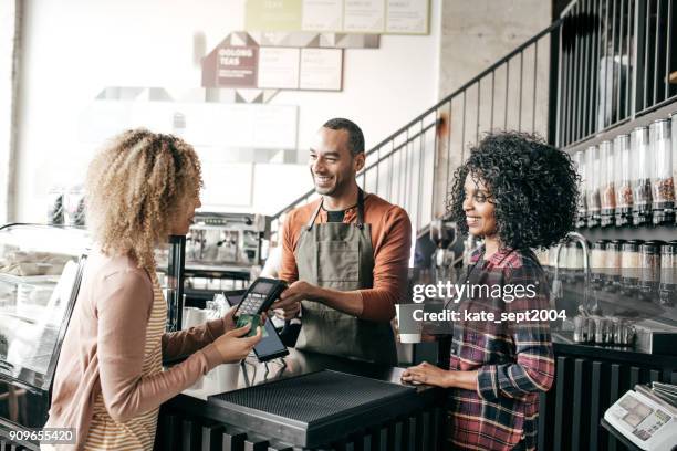 bying activitiy during the lunch hours - tea room stock pictures, royalty-free photos & images
