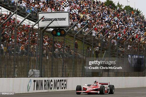 Scott Dixon, drives the Target Chip Ganassi Racing Dallara Honda across the finish line during the IndyCar Series Bridgestone Indy Japan 300 Mile on...