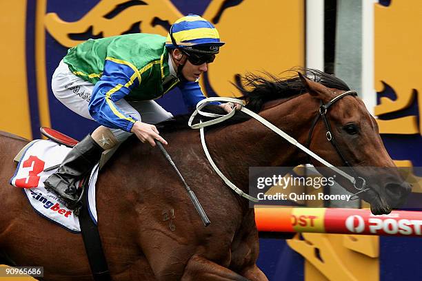 Jason Maskiell riding Tribunal crosses the line to win the New Litho Plate during the Underwood Stakes Day at Caulfield Racecourse on September 19,...