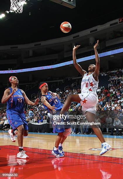 Sancho Lyttle of the Atlanta Dream grabs a rebound during Game 2 of the WNBA Eastern Conference Semifinals against the Detroit Shock at Gwinnett...