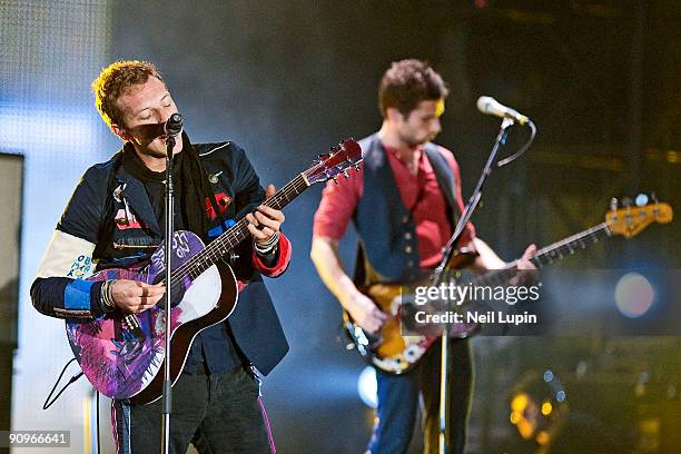 Chris Martin and Guy Berryman of Coldplay perform on stage at Wembley Stadium on September 18, 2009 in London, England.