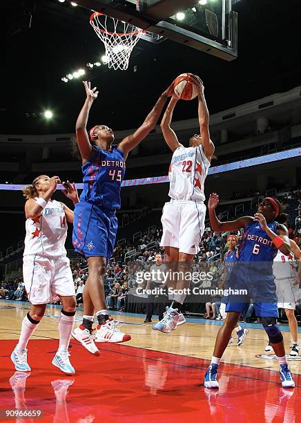Armintie Price of the Atlanta Dream battles for a rebound during Game 2 of the WNBA Eastern Conference Semifinals against Kara Braxton of the Detroit...