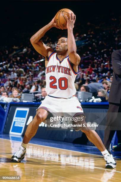 Allan Houston of the New York Knicks handles the ball during a game played on March 23, 1997 at Madison Square Garden in New York City. NOTE TO USER:...
