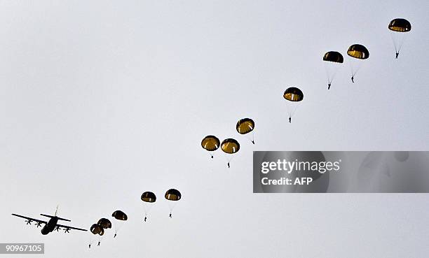 Parachutes are being dropped at Ginkel Heath in Ede, the Netherlands, on September 19, 2009. The activity is organised to mark the 65th anniversary...