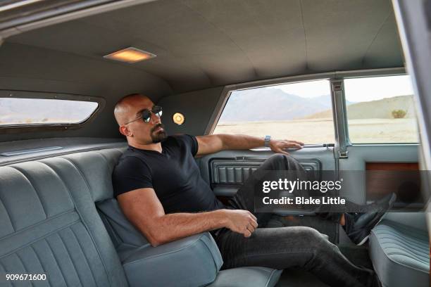 middle eastern man in car - society stock pictures, royalty-free photos & images