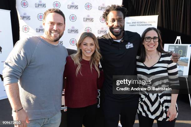 Yael and Scooter Braun, Patrick Beverley of the LA Clippers and Gillian Zucker, president of business operations of the LA Clippers, pose for a photo...
