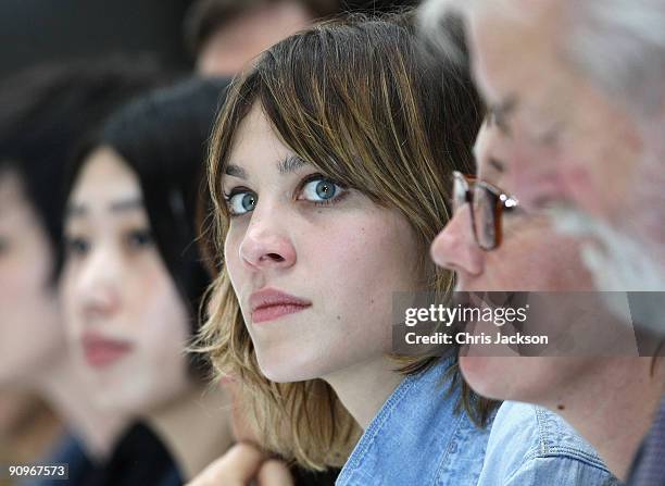 Presenter Alexa Chung smiles during the Margaret Howell Fashion show London Fashion Week Spring / Summer 2010 at the Margaret Howell Store on...