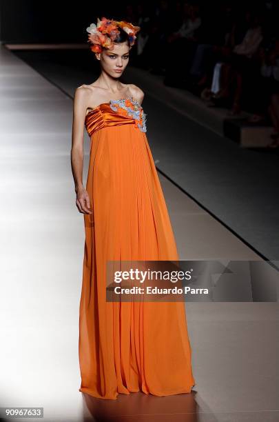 Model walks the runway during the Victorio & Lucchino show part of theCibeles Madrid Fashion Week Spring/Summer 2010 at Pasarela Cibeles on September...