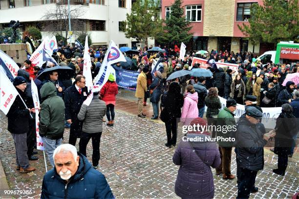 People gather on the spot, where Turkish journalist Ugur Mumcu was assassinated, during a commemoration to mark the 25th anniversary of his death in...