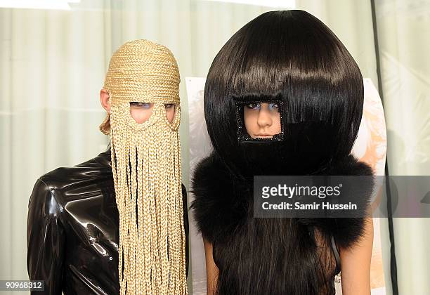 Models prepare backstage ahead of the Charlie Le Mindu Spring/Summer 2010 show as part of Blow Presents during London Fashion Week at the Royal...